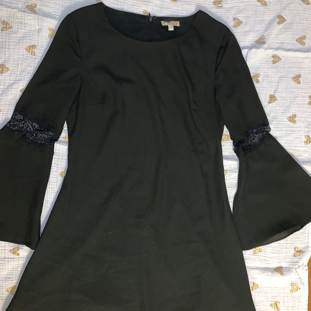 Black dress with lace and bell sleeves